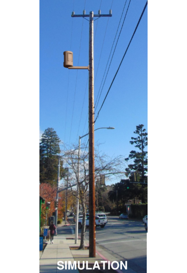 Photo of an existing small cell facility side-arm mounted on a wood joint utility pole